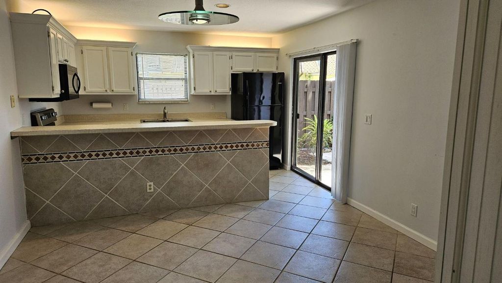 Photo of 110 N Delaware Boulevard #6d, Jupiter, FL 33458 (MLS # R10963554)