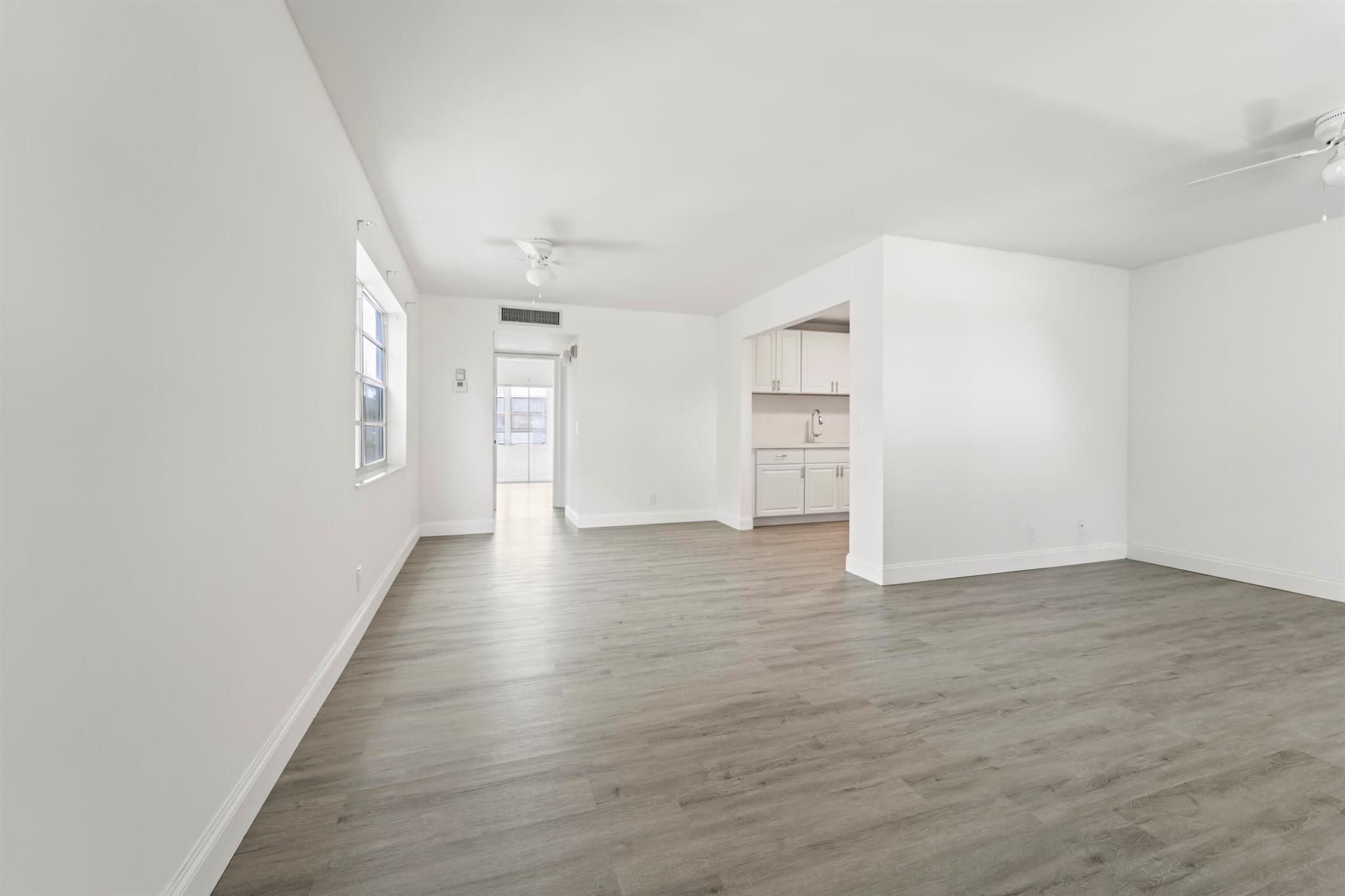 Beautifully Renovated 1 Bedroom, 1.5 Bath Condo in Premier 55+ CommunityStep into style and comfort with this meticulously redone second-floor condo, located in the heart of the vibrant Kings Point active adult community. This spacious 1-bedroom, 1.5-bath residence boasts a host of modern upgrades designed for both elegance and functionality.Enjoy a brand-new kitchen featuring contemporary cabinetry, sleek quartz countertops, and updated appliances--perfect for cooking and entertaining. Both bathrooms have been refreshed with new vanities, offering a clean and modern aesthetic. The main living area and bedroom are adorned with new, high-quality flooring that enhances the home's warm and inviting atmosphere.One of the standout features is the enclosed lanai, housing a full-sized