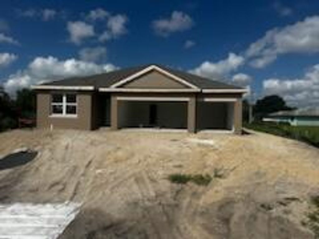 Photo of 6944 NW Hershy Circle, Port Saint Lucie, FL 34983 (MLS # R10972452)