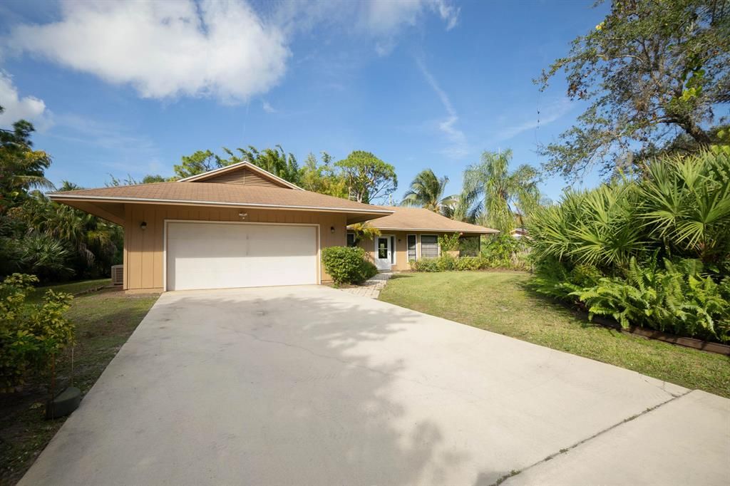 Photo of 2775 SW Bridgeway Street, Palm City, FL 34990 (MLS # R10766574)
