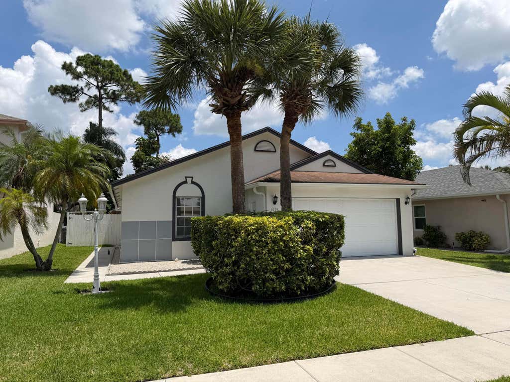Photo of 6196 Azalea Circle, West Palm Beach, FL 33415 (MLS # B26041566)