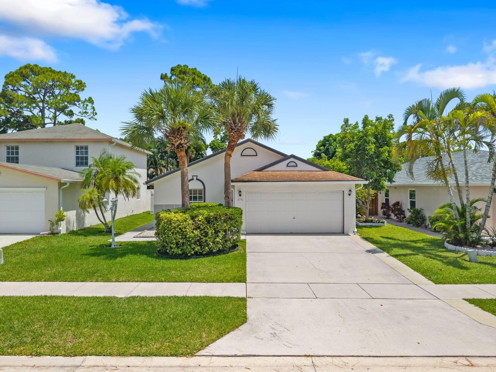 Photo of 6196 Azalea Circle, West Palm Beach, FL 33415 (MLS # B26041566)