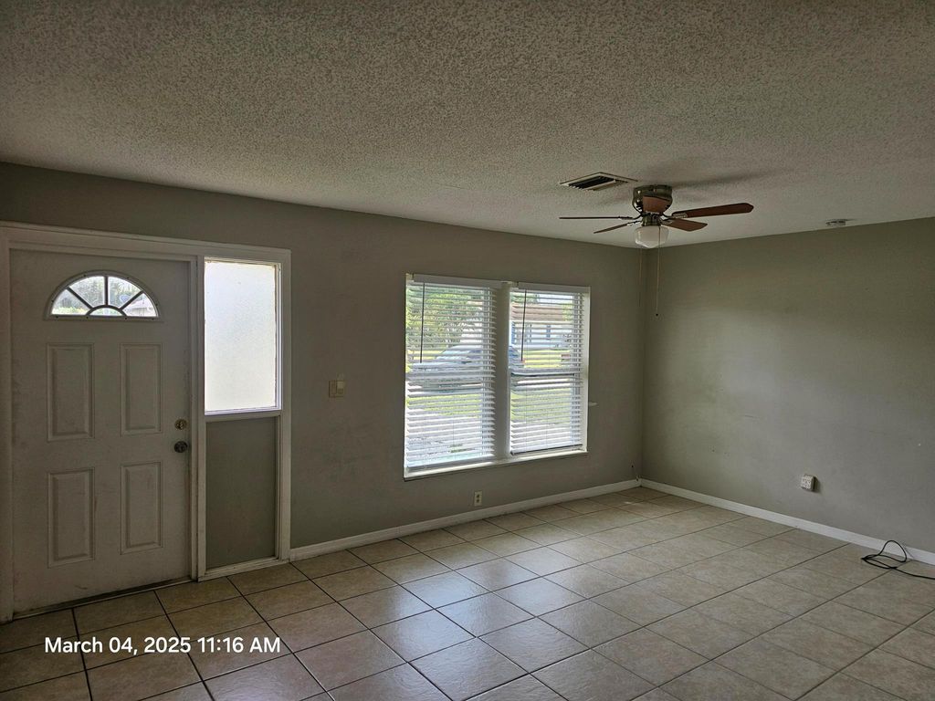 Photo of 1297 SE Petunia Avenue, Port Saint Lucie, FL 34952 (MLS # R11068819)