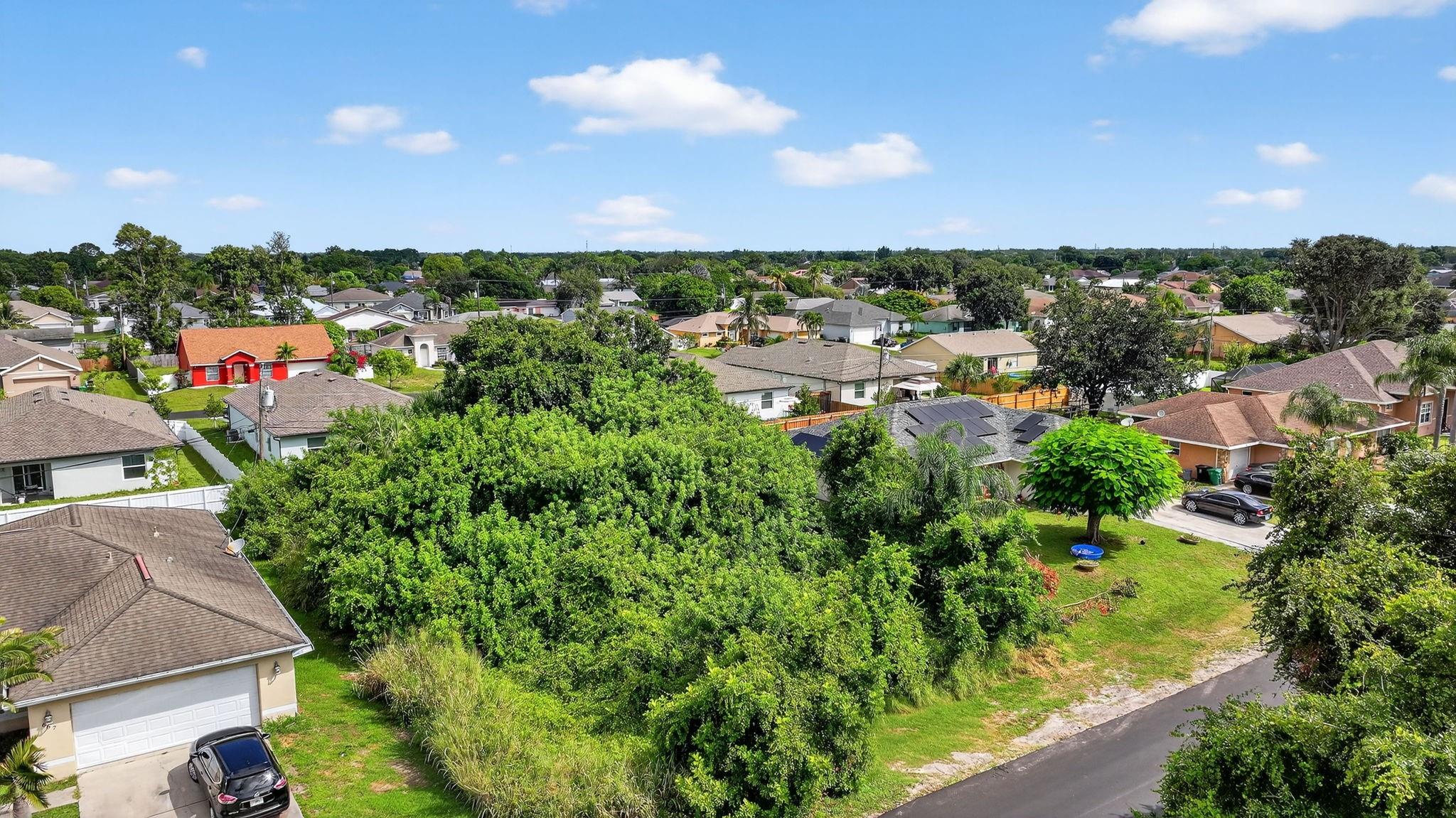 Build your custom dream home on this 10k sq ft lot, within close proximity to schools, parks, shops, golfing, recreational facilities, Turnpike, and I-95. At only 13 miles to the beautiful beaches of the Atlantic Ocean, this prime location offers convenience within an established, quaint suburban community. Treasure Coast Square mall is less than 8 miles away and the fine dining and shopping experience of Tradition is within 5 miles.