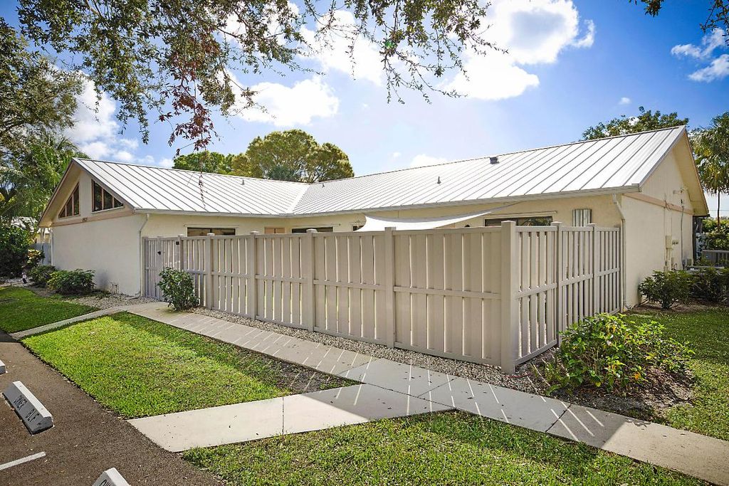 Photo of 8920 Thumbwood D Circle #D, Boynton Beach, FL 33436 (MLS # R11066640)