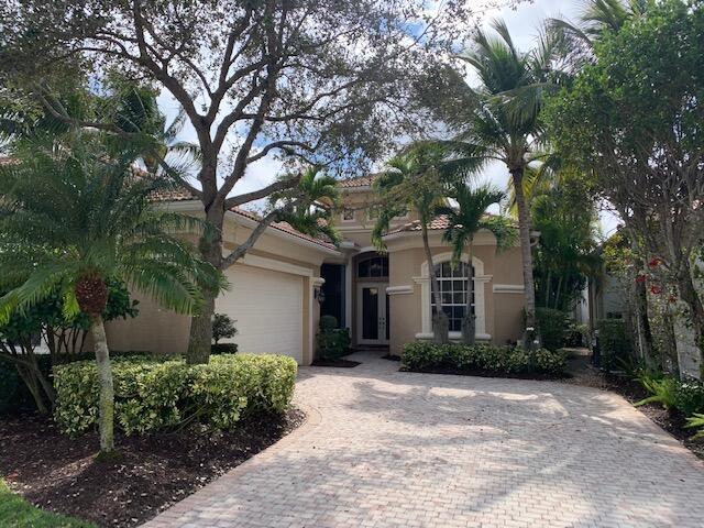 Beautiful updated Mirasol home with Full Golf Membership and lovely Lake View.
