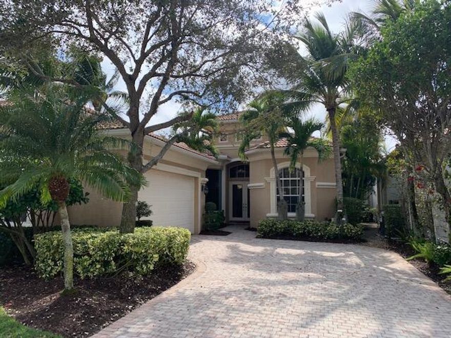 Beautiful updated Mirasol home with Full Golf Membership and lovely Lake View.