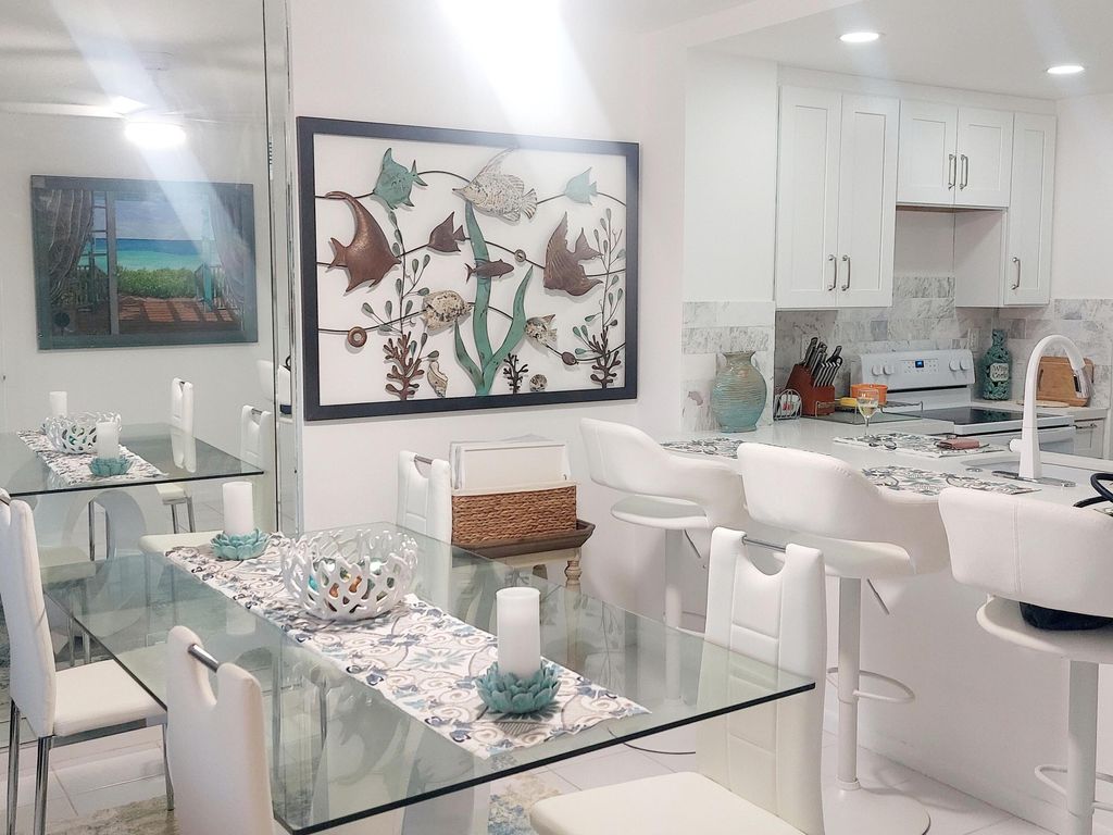 Photo of 3540 S Ocean Boulevard #714, South Palm Beach, FL 33480 (MLS # R10850450)