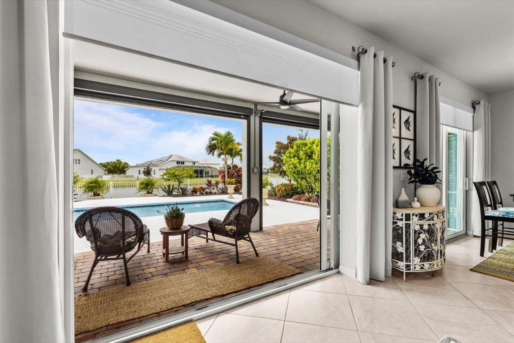 Photo of 10460 SW Captiva Dr, Port Saint Lucie, FL 34987 (MLS # R11120511)