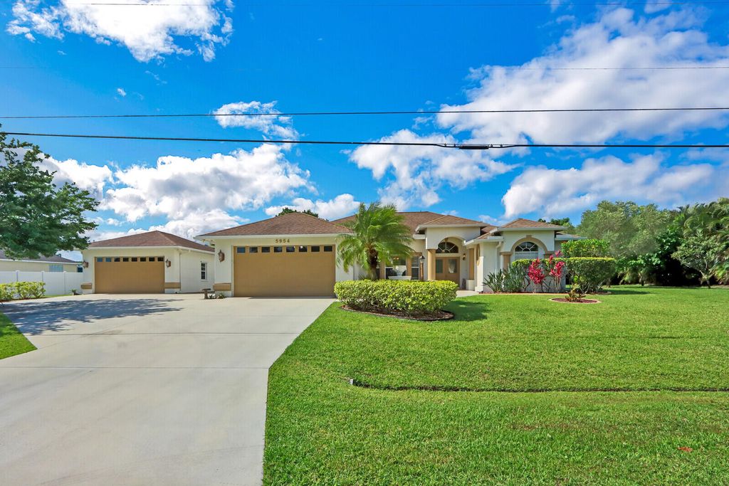 Photo of 5954 NW Brenda Circle, Port Saint Lucie, FL 34986 (MLS # R10798741)