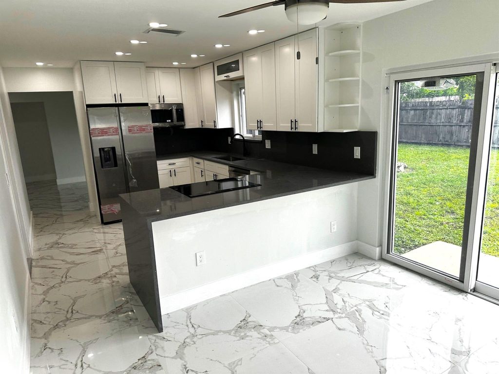 Photo of 11150 Delta Cir, Boca Raton, FL 33428 (MLS # R11016124)