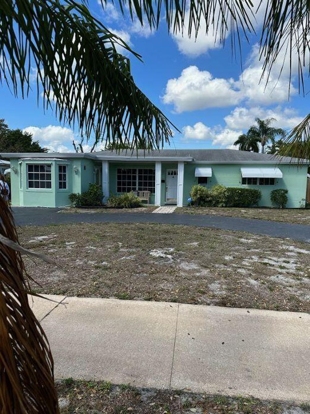 Photo of 335 Flagler Boulevard, Lake Park, FL 33403 (MLS # R10868196)