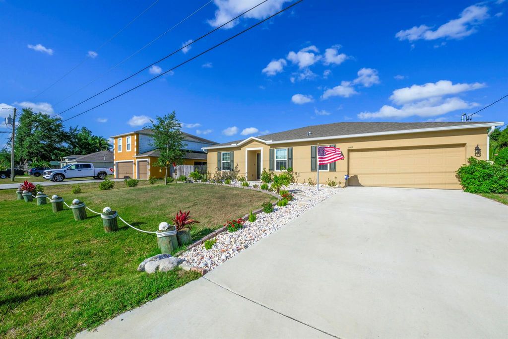 Photo of 4042 SW Jaqust Street, Port Saint Lucie, FL 34953 (MLS # R11084681)