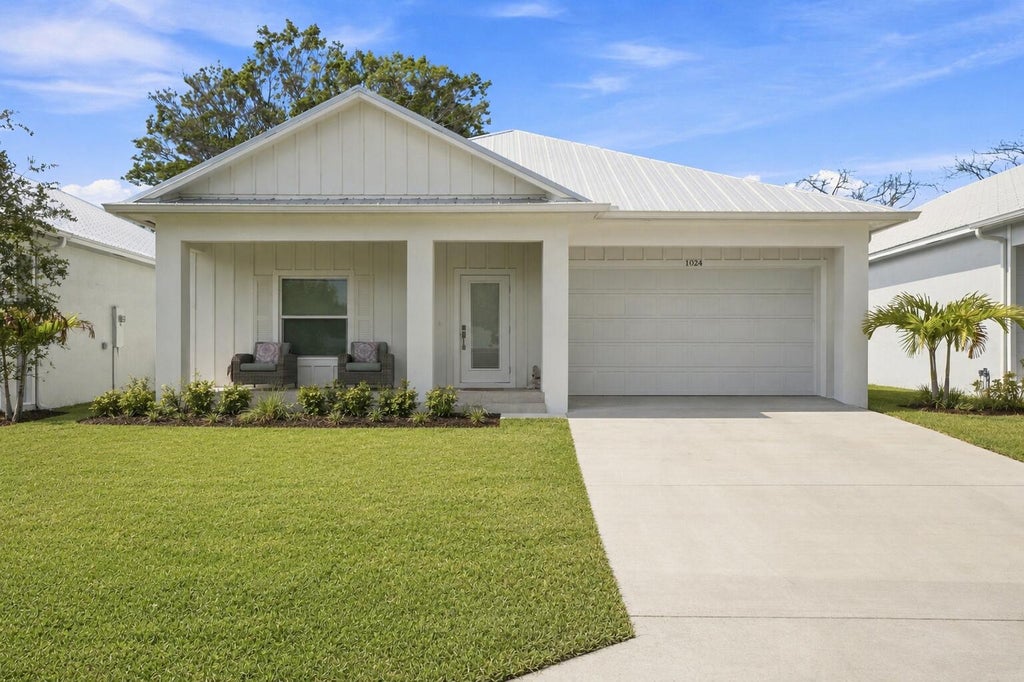 Photo of 1024 SW 35TH Street, Palm City, FL 34990 (MLS # B26067705)