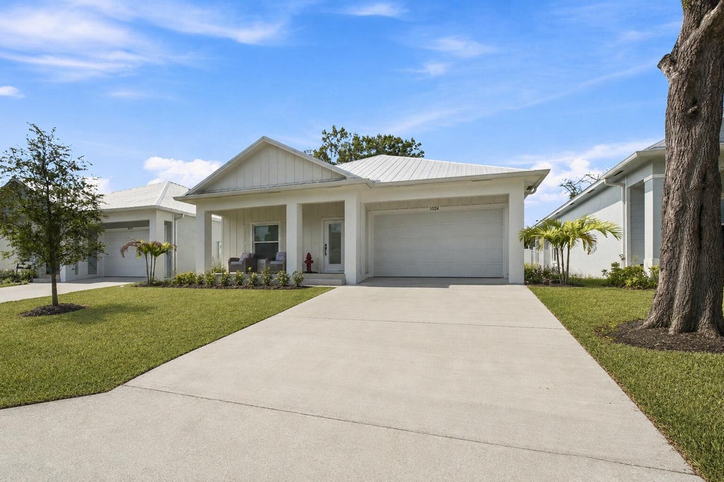 Photo of 1024 SW 35TH Street, Palm City, FL 34990 (MLS # B26067705)