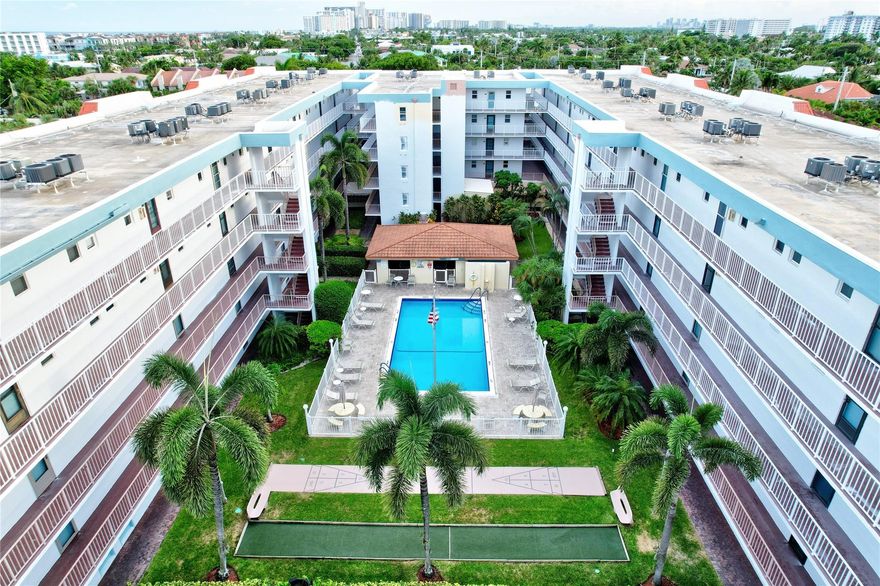 Condo living at its best in the heart of Lauderdale by the Sea! This spacious 2 bed/2 bath unit offers nearly 1,200 sf, a large east-facing entry with a courtyard and pool peek, and a split-bedroom layout with 2 ensuite baths and ample closets. Features include impact windows and doors, an eat-in kitchen with passthrough, and assigned covered parking. Poinciana by the Sea is a well-maintained complex with tropical landscaping, a heated pool, cabana with BBQs, and bocce/shuffleboard courts. Low HOA fees with reserves. A quick walk to Publix, pristine beaches, snorkeling, shops, and the vibrant and quaint downtown of Lauderdale By The Sea. Make This YOUR Paradise!