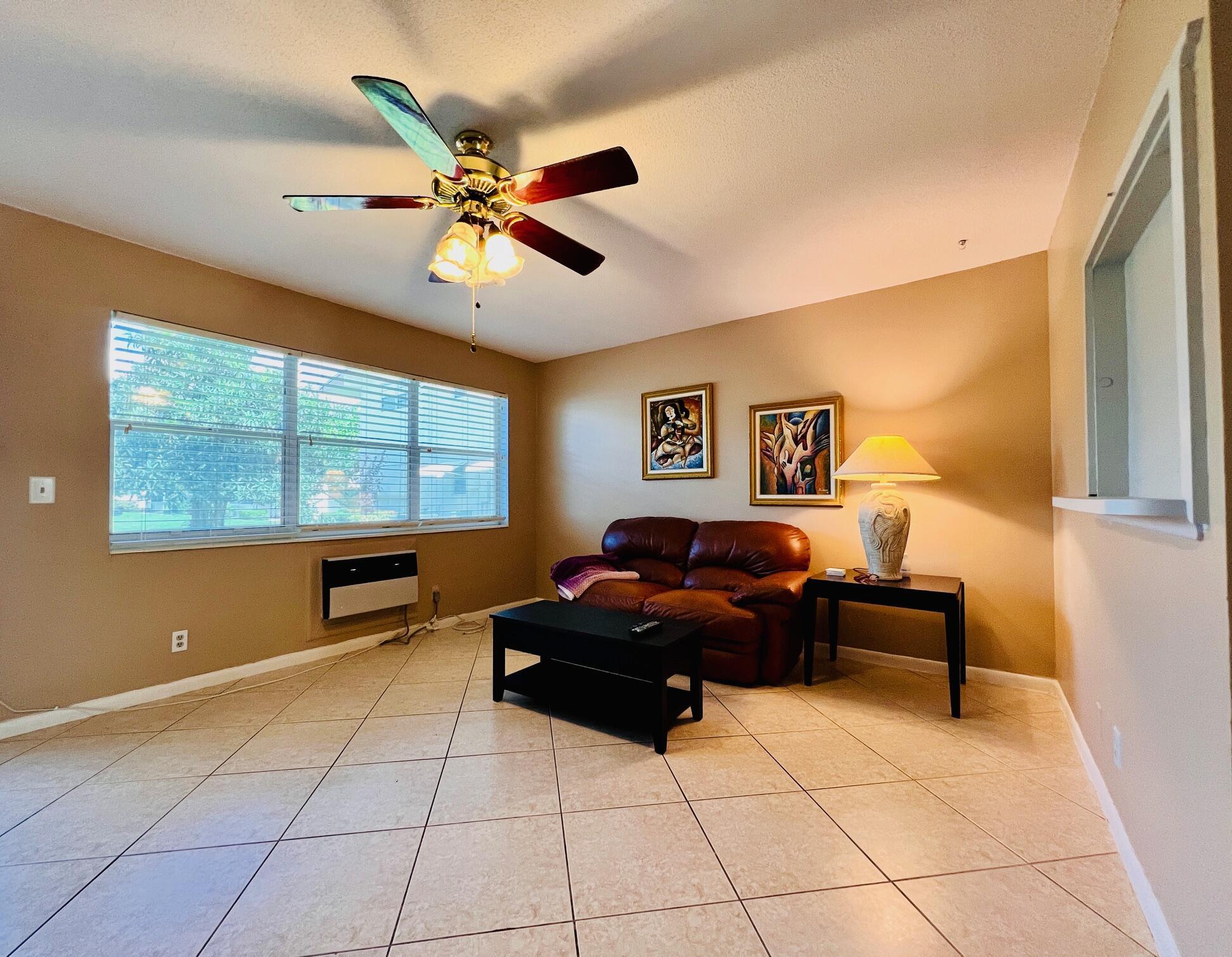 Delightful With Updates In 55+ Century Village! FIRST FLOOR 1/1 With Updated Kitchen & Bath. Pretty Kitchen With Updated Crisp White Cabinets & Granit Counters. Updated Bath With Step-In Shower. Tile Flooring. Sold With Furnishings As Shown. Nicely Maintained Building With Resident Patio and New Roof (2021). Century Village Is A Vibrant Resort Style 55+ Community Centrally Located In Desirable Palm Beach County. Enjoy An Active Lifestyle With All That Century Village Offers...