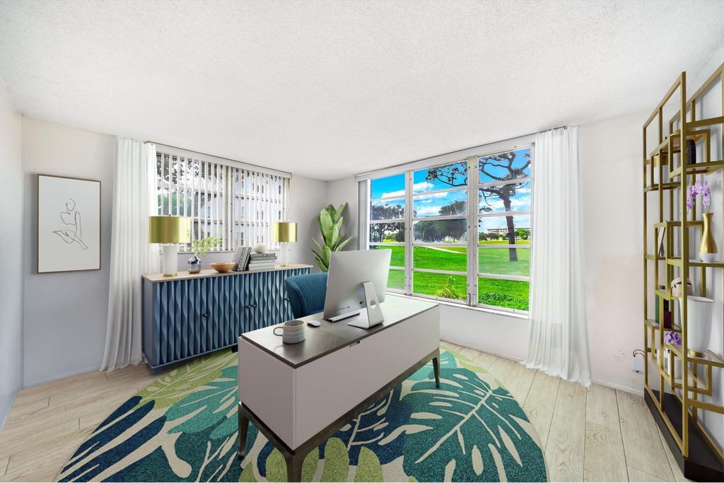 Photo of 2601 S Course Drive #111, Pompano Beach, FL 33069 (MLS # F10551715)