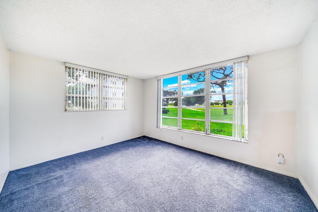 Photo of 2601 S Course Drive #111, Pompano Beach, FL 33069 (MLS # F10551715)