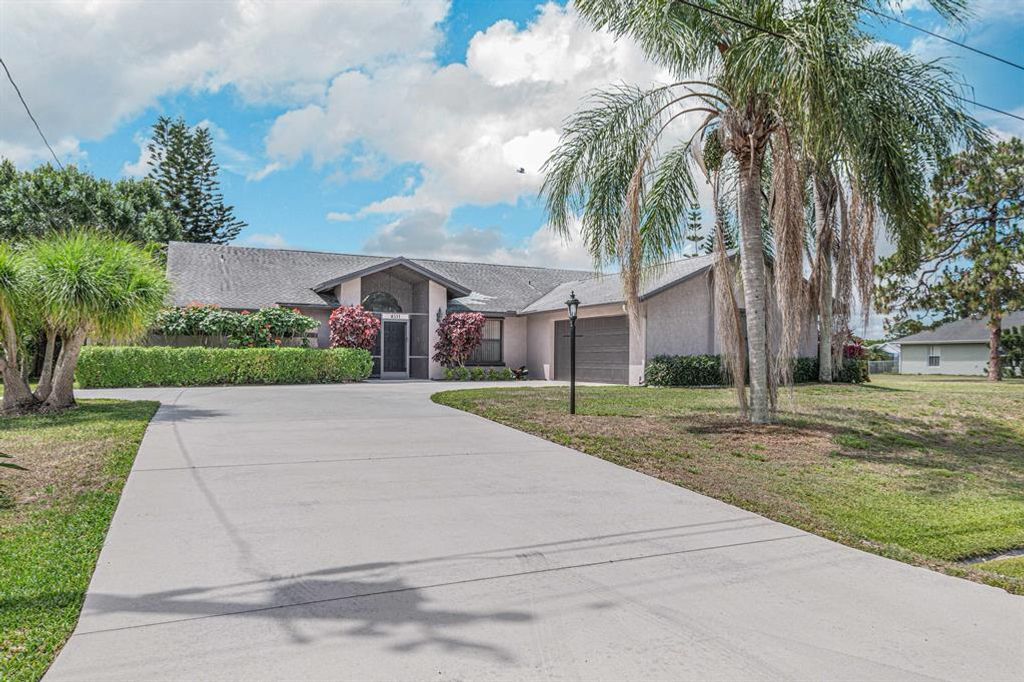 Photo of 4511 NW Brownell Terrace, Port Saint Lucie, FL 34983 (MLS # R10715647)