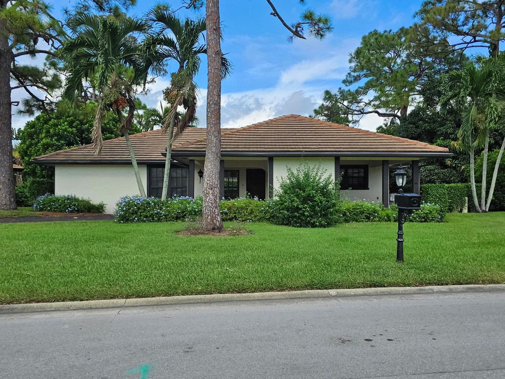 Photo of 435 Pine Villa Drive, Atlantis, FL 33462 (MLS # R10924619)