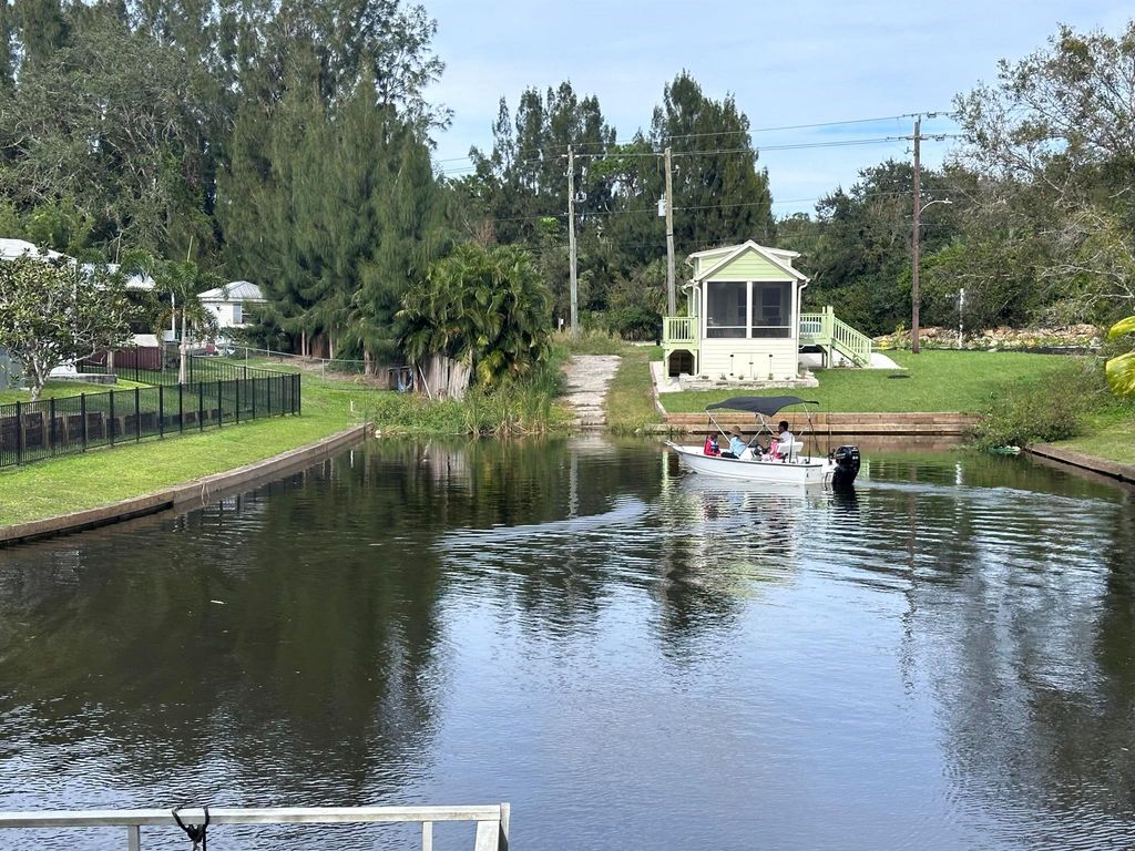 Photo of 7802 SE Paradise Drive, Stuart, FL 34997 (MLS # R11076641)