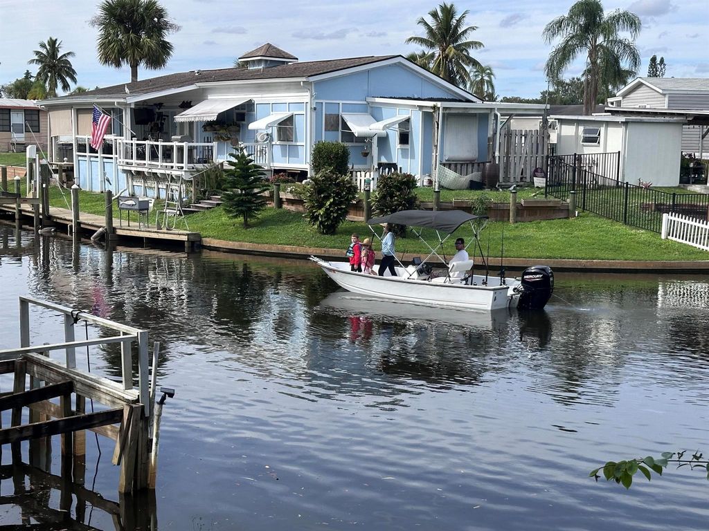 Photo of 7802 SE Paradise Drive, Stuart, FL 34997 (MLS # R11076641)