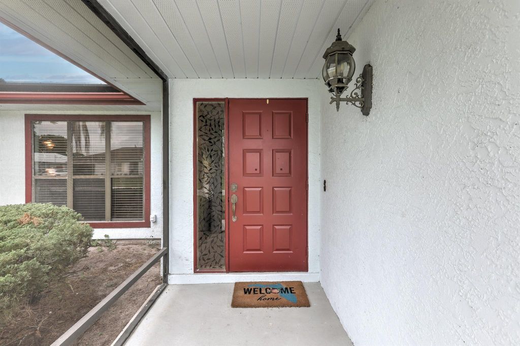 Photo of 521 SW Bacon Terrace, Port Saint Lucie, FL 34953 (MLS # R10988903)