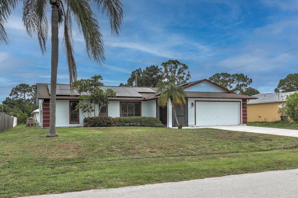 Photo of 521 SW Bacon Terrace, Port Saint Lucie, FL 34953 (MLS # R10988903)