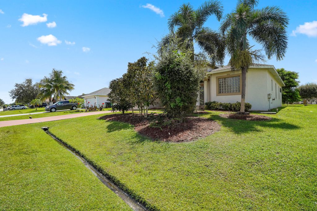 Photo of 1092 SW Majorca Avenue, Port Saint Lucie, FL 34953 (MLS # B26021214)