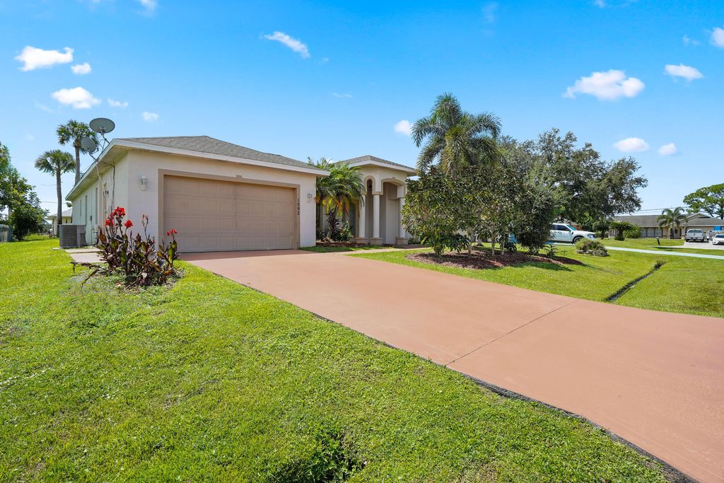 Photo of 1092 SW Majorca Avenue, Port Saint Lucie, FL 34953 (MLS # B26021214)