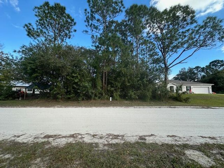 Vero Lake Estates lot . Many new homes being built around this lot. Great location minutes from I-95 and the  Sebastian ad Fellsmere. County only Taxes !!