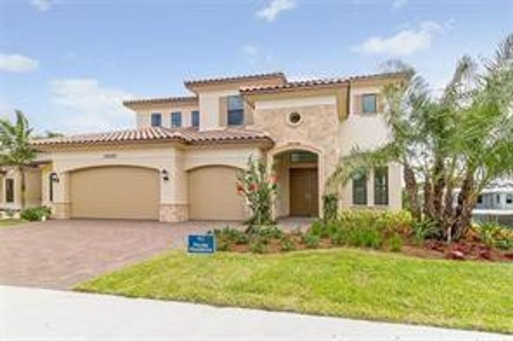 Photo of 12165 Lake House Lane, Parkland, FL 33076 (MLS # B26021421)
