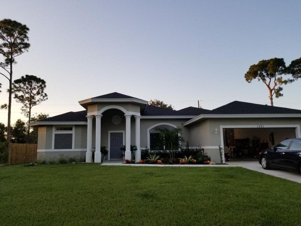 Photo of 1221 SW Albenga Avenue, Port Saint Lucie, FL 34953 (MLS # R10711269)