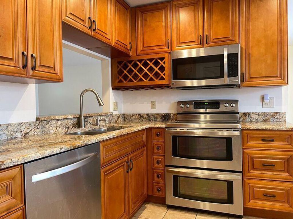 Photo of 499 Iris Avenue, Palm Beach Gardens, FL 33410 (MLS # R11107881)