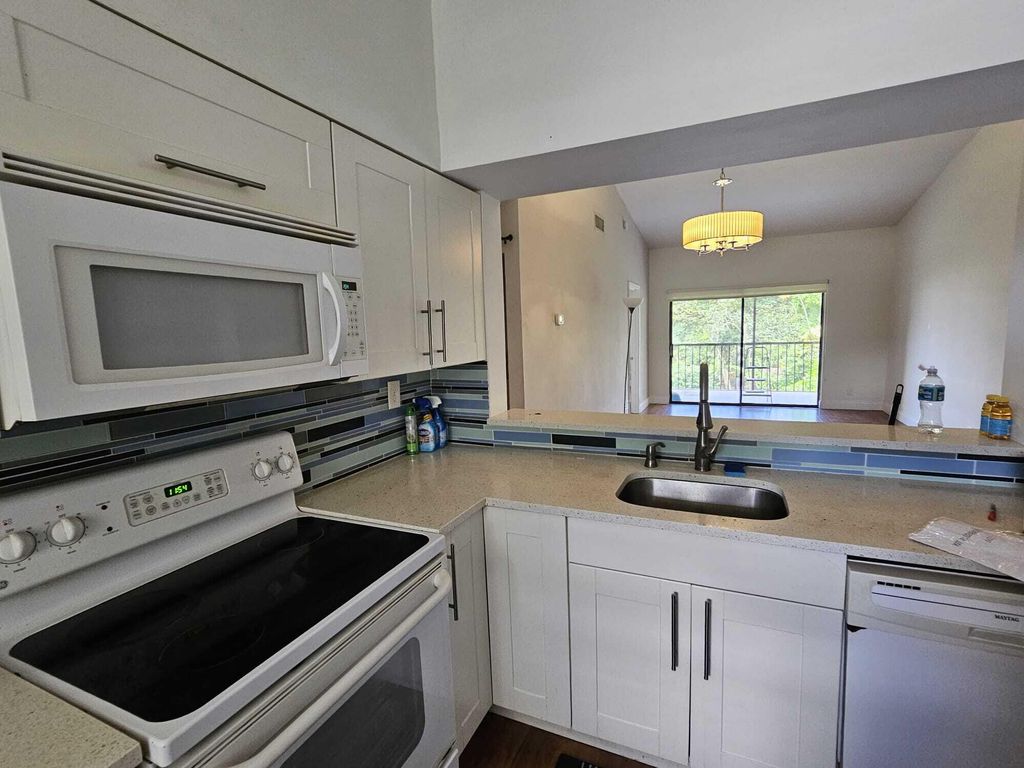 Photo of 3130 Millwood Terrace #214, Boca Raton, FL 33431 (MLS # R11093822)