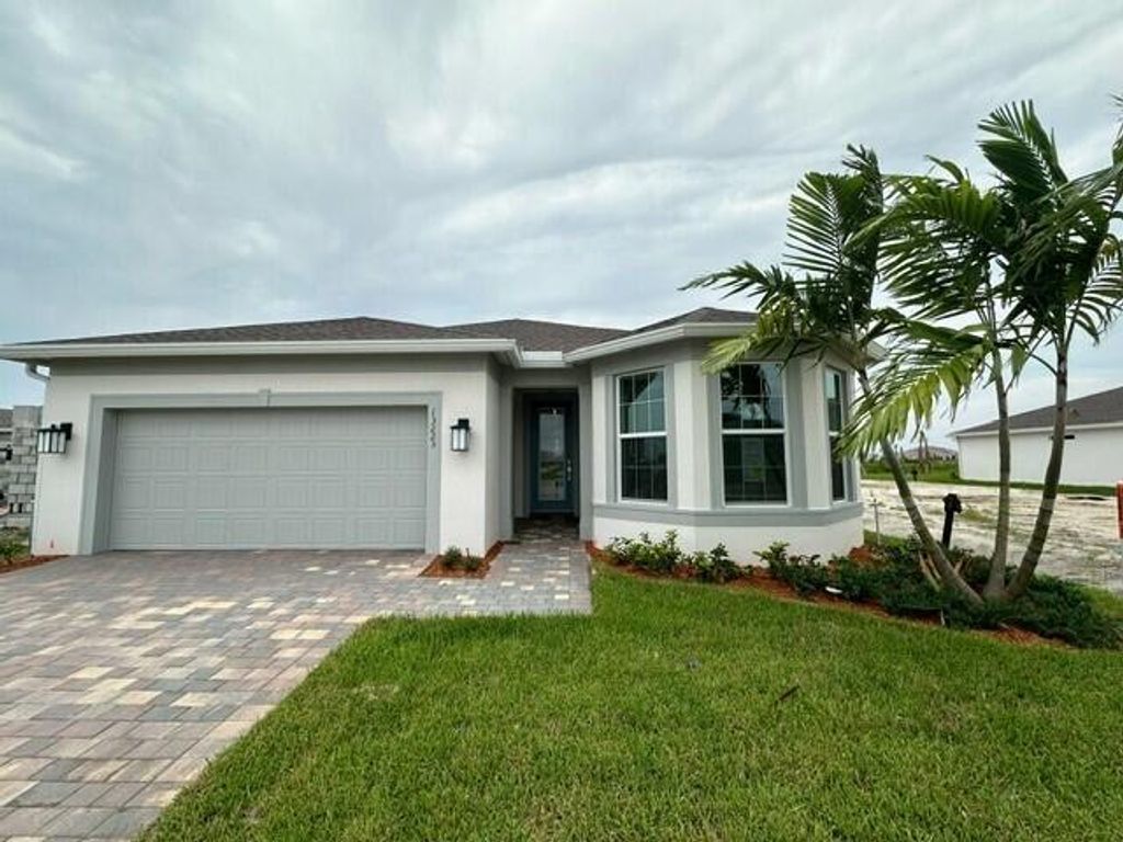 Photo of 13223 SW Calita Way, Port Saint Lucie, FL 34987 (MLS # R11010803)