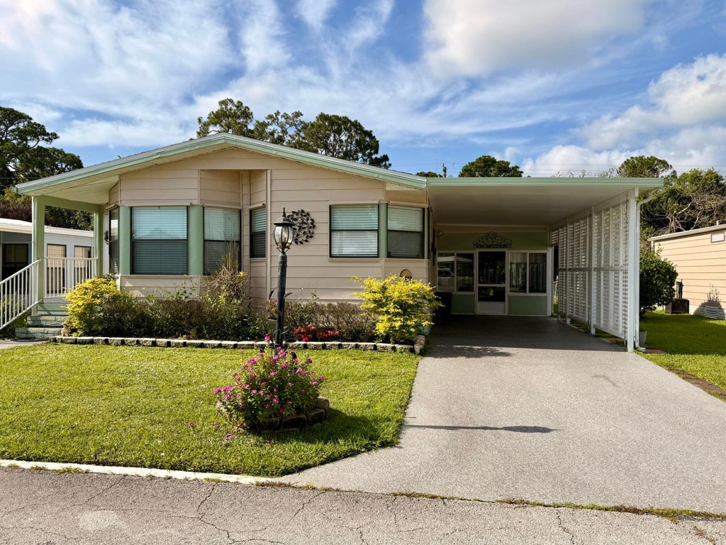 Photo of 8581 Florence Drive, Port Saint Lucie, FL 34952 (MLS # B26053520)