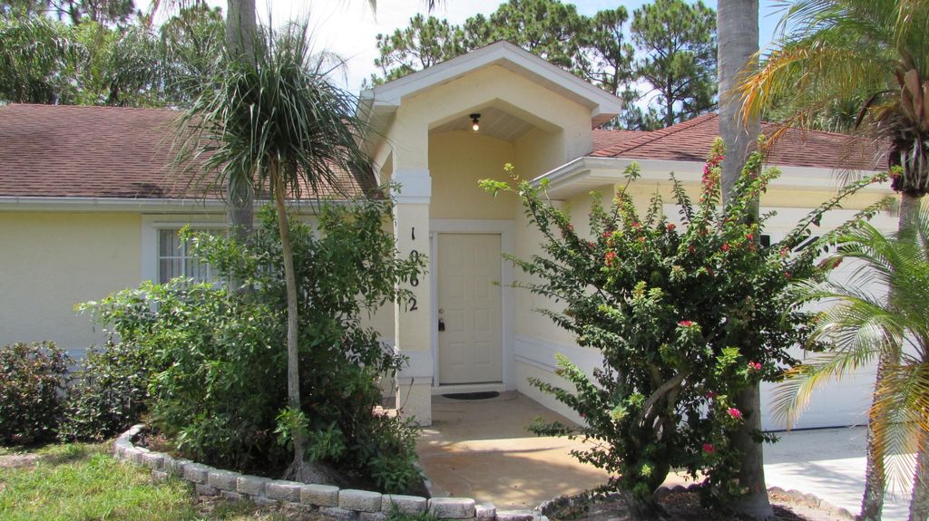 Photo of 1062 SW Deauville Avenue, Port Saint Lucie, FL 34953 (MLS # R10801115)