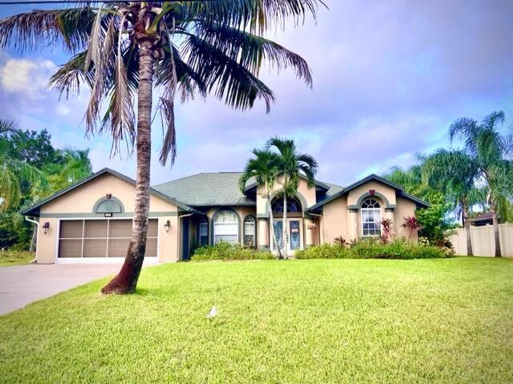 Photo of 1157 SW Jacqueline Avenue, Port St Lucie, FL 34953 (MLS # R10844208)