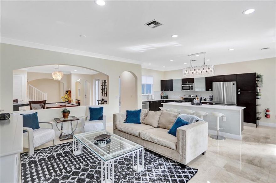 Welcome to this stunning two-story townhome located in the heart of the city, just steps away from the best entertainment and dining destinations. Located close to the IMAX Theater, Broward Performing Arts Center, Riverwalk, Las Olas, Shopping, Marina, and a variety of restaurants. Step inside and be greeted by a spacious layout that offers over 3,000 sqft of living space for comfortable living. The office space is perfect for those who work from home or need a private place to focus. The master bedroom is an oasis of comfort boasting an impressive 22 x 14 feet of space, complete with a private balcony and large walk-in closets. Impact windows and doors throughout. This townhome is being sold fully furnished, so you can move in right away and start enjoying your new home. There is no HOA.