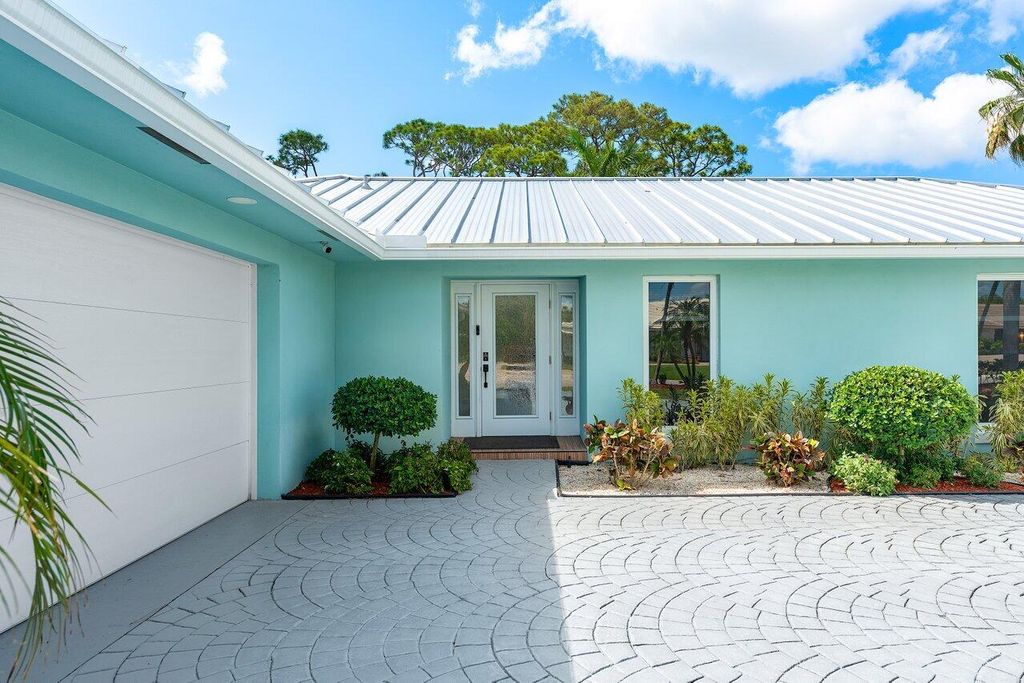 Photo of 474 S Country Club Drive, Atlantis, FL 33462 (MLS # R11089361)