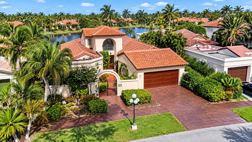 Photo of 556 Deer Creek Via Genova, Deerfield Beach, FL 33442 (MLS # B26085662)