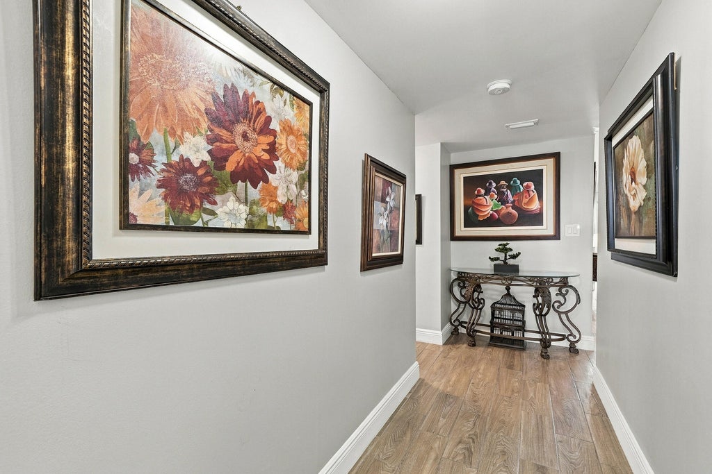 Photo of 3535 BROKEN WOODS Drive #404, Coral Springs, FL 33065 (MLS # B26094879)