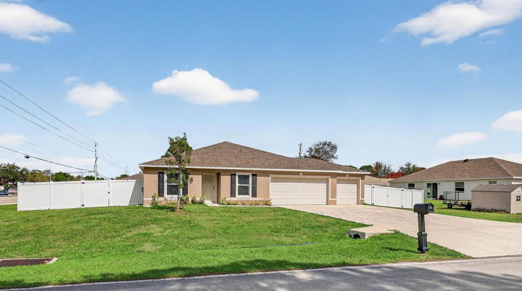 Photo of 1691 SW Andalusia Rd, Port Saint Lucie, FL 34953 (MLS # B26000937)