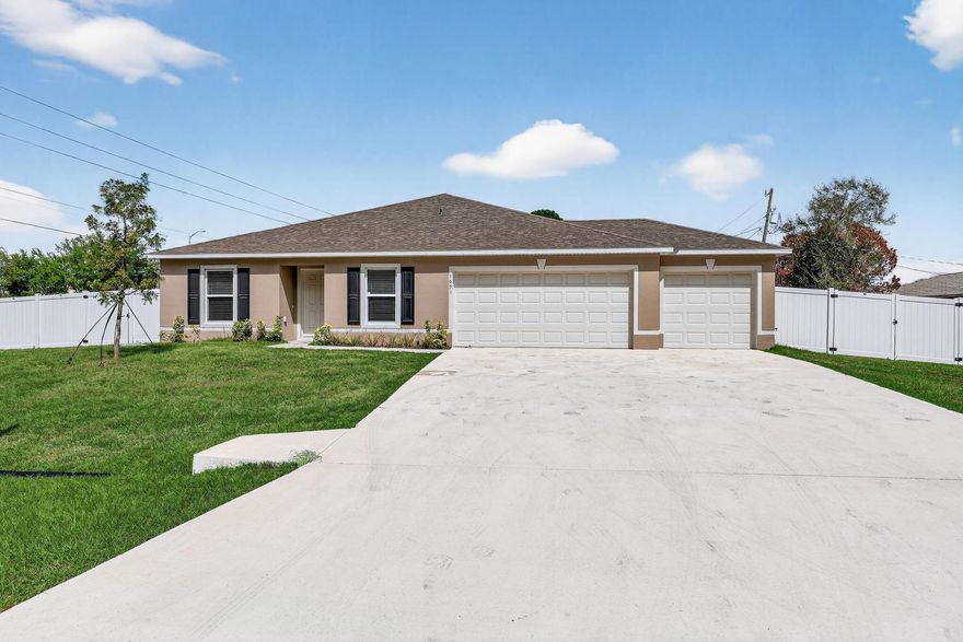 This stunning 4-bedroom, 2-bathroom, 3-car garage home offers a split bedroom layout with functional living space. Inside, you'll find a beautiful kitchen with stainless steel appliances,  a large living room, formal dining room, modern bathrooms and upgraded tile flooring. A generously-sized privacy fenced backyard offers ample outdoor space, perfect for relaxing and entertaining. Its prime location ensures easy access to the I-95, restaurants and shopping, making it a desirable residence that is sure to attract attention. Room sizes are approximate and subject to error.