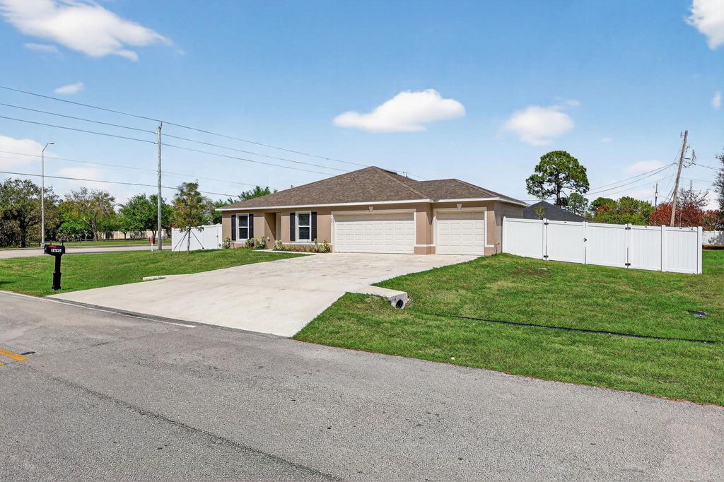 Photo of 1691 SW Andalusia Rd, Port Saint Lucie, FL 34953 (MLS # B26000937)