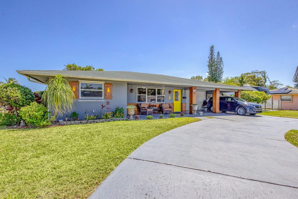 Photo of 206 Evergreen Drive, Lake Park, FL 33403 (MLS # R11084187)