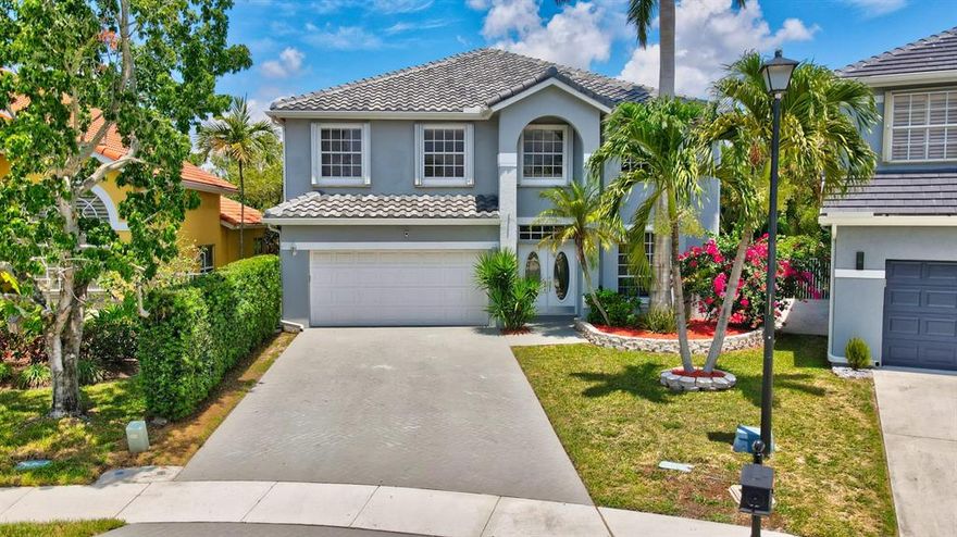 Fabulous 2-story pool home with 5 bedrooms, 2-1/2 bathrooms and 2 car garage located one of the largest lots in La Costa on a cul-de-sac.  Roof replaced in 2020 and new air conditioner installed in August 2019.  Additional features include beautifully updated kitchen with custom cabinets with granite countertops, stainless appliances, huge master suite with 2 large walk-in closets and newly renovated bathroom with separate shower, spa tub, and 2 vanities with quartz countertops.  Main level guest bathroom and upstairs bathroom have new vanities with granite tops.  Downstairs is all tile and stairs and upstairs are wood laminate.  House has accordion & panel shutter & hurricane rated garage door.  Residents have access to the Mission Bay Club that offers resort style amenities including luxurious clubhouse, heated salt-water pool, hot tub, sauna, steam room, fitness center with daily classes, & tennis center offering numerous programs.   There is also a playground with canopy, basketball & racquetball courts, and soccer field.  Close to shopping, restaurants, and major highways.  Fantastic schools include Sandpiper Shores Elementary, Loggers Run Middle and West Boca High School.