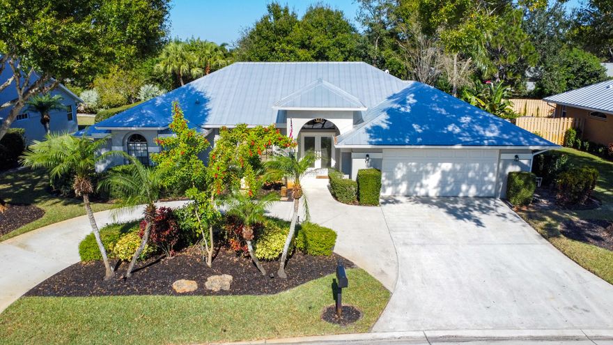 Exquisite 4 bedroom, 2.5 bath Palm City residence showcasing a fully renovated gourmet kitchen with an oversized island, double ovens, walk-in pantry, and impeccable designer finishes—every detail curated with intention. Elegant upgraded bathrooms, a brand-new roof, and a stunning screened-in pool complete with a cabana bath and outdoor shower create a seamless blend of comfort and sophistication. The beautifully landscaped backyard offers a private retreat ideal for refined living. Located in Hunters Creek, a gated community with low HOA fees and minimal restrictions, this home delivers luxury and convenience in one.